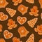 Seamless pattern Christmas gingerbread cookies on dark background. Vector