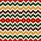 Seamless pattern in Christmas traditional colors. Chevron zigzag bright colors horizontal lines background.