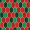 Seamless pattern in Christmas traditional colors with diamonds grid. Turtle shell motif. Honeycomb wallpaper.
