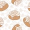 Seamless pattern with cinnamon rolls and spice. Freshly baked sweet pastry with frosting and spice.