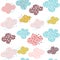 Seamless pattern with clouds and hand drawn shapes. Creative childish background for fabric, textile