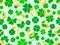 Seamless pattern with clover leaves and horseshoes for St. Patrick\\\'s Day. Clover leaves and a horseshoe