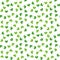 Seamless pattern of clover leaves. Random floral vector background. Green plant. Traditional Iraland holiday symbol