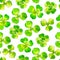 Seamless pattern with clover, watercolor illustrated background.