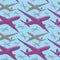 Seamless pattern of colored airliners