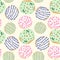 Seamless pattern of colored glazed donuts on a yellow background. Cute sweet dessert background.