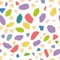 Seamless pattern. Colored painted pieces on a white background