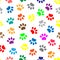 Seamless pattern with colored paws animal vector design.