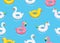 Seamless pattern of colorful animals floats cute kids toys on blue background