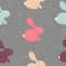 Seamless pattern with colorful bunny on white. Vector cute texture with rabbit on grey background