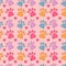 Seamless pattern with colorful pets paws. Cat or dog footprint outline cute childish bright background with hearts on pink. Animal