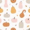 Seamless pattern with colorful pumpkins.
