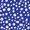 Seamless pattern of colorful vector jewels gemstones and crystals on blue background