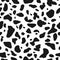 Seamless pattern. Cow or dalmatian. Spots. Black and white.  Animal print, texture. Vector background.