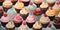 Seamless pattern with cupcake assortment. Colorful cupcakes pattern. Cupcake background illustration for design, menu, web site,