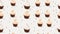 Seamless pattern of cupcakes on white polka dot background