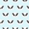 Seamless pattern with cute badgers on blue background.