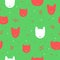 Seamless pattern with cute cat heads. Various red and white heads on a green background.