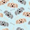 Seamless pattern of cute dog faces and bones on a gentle blue background. Vector illustration. Baby Wallpaper background