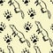 Seamless pattern with cute ferrets and their footprints on a yellow background. Design for wallpaper, textiles