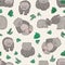 Seamless pattern with cute hand drawn wombats and green leaves. Backdrop with funny adult and baby animals on light