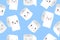 Seamless pattern with cute kawaii cartoon toilet paper rolls with faces. Vector