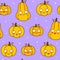 Seamless pattern with cute pumpkins on violet background - cartoon wallpaper for funny Halloween autumn textile or wrapping paper