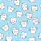 Seamless pattern with cute teeth on blue background - for kid dental design