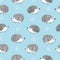 Seamless pattern with cute watercolor hedgehogs on blue.