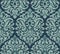 Seamless pattern with Damask motifs in blue tones