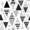 Seamless pattern with decorative hand-drawn triangles. Vector bl