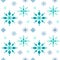 Seamless pattern of delicate graceful snowflakes on a white background. Snowflakes of different shapes and sizes, different shades