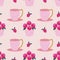 Seamless pattern of delicious flower cupcakes, strawberries, and cute polka dot teacups for an afternoon tea party.