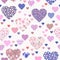 Seamless pattern with different beautiful hearts with floral and geometric ornaments. Patchwork design