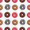 Seamless pattern different colorful donuts on white background isolated top view, donut repeating ornament, bagels wallpaper