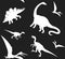 Seamless pattern of different dinosaur silhouette