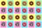 Seamless pattern of different donuts on bright checkered multi-colored background top view, tasty doughnuts on chequered backdrop