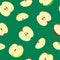 Seamless pattern with different halves of apples. Vector illustration.