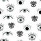 Seamless pattern with different stylized eyes