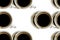 Seamless pattern of dirty cups with coffee on a white background