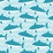 Seamless pattern with flock of cute cartoon sharks