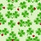 Seamless pattern with four leaves clover