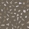 Seamless pattern with fragments of stones in beige and gray color in the style of terrazio