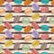 Seamless pattern with French sweet dessert macaroons on watercolor stripes