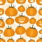 Seamless pattern of funny pumpkins. Halloween party background