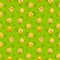 Seamless pattern with funny round yellow comic stickers on green background.