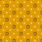 Seamless pattern with glitter dots on a yellow background