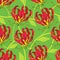 Seamless pattern with Gloriosa superba or flame lily, tropical flower and ornate leaf on the green background.