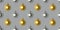 Seamless pattern with gold and silver Christmas decorations on a gray background. Color of the year 2021. Ultimate Grey and