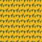 Seamless pattern with green cactuses on orange desert background.